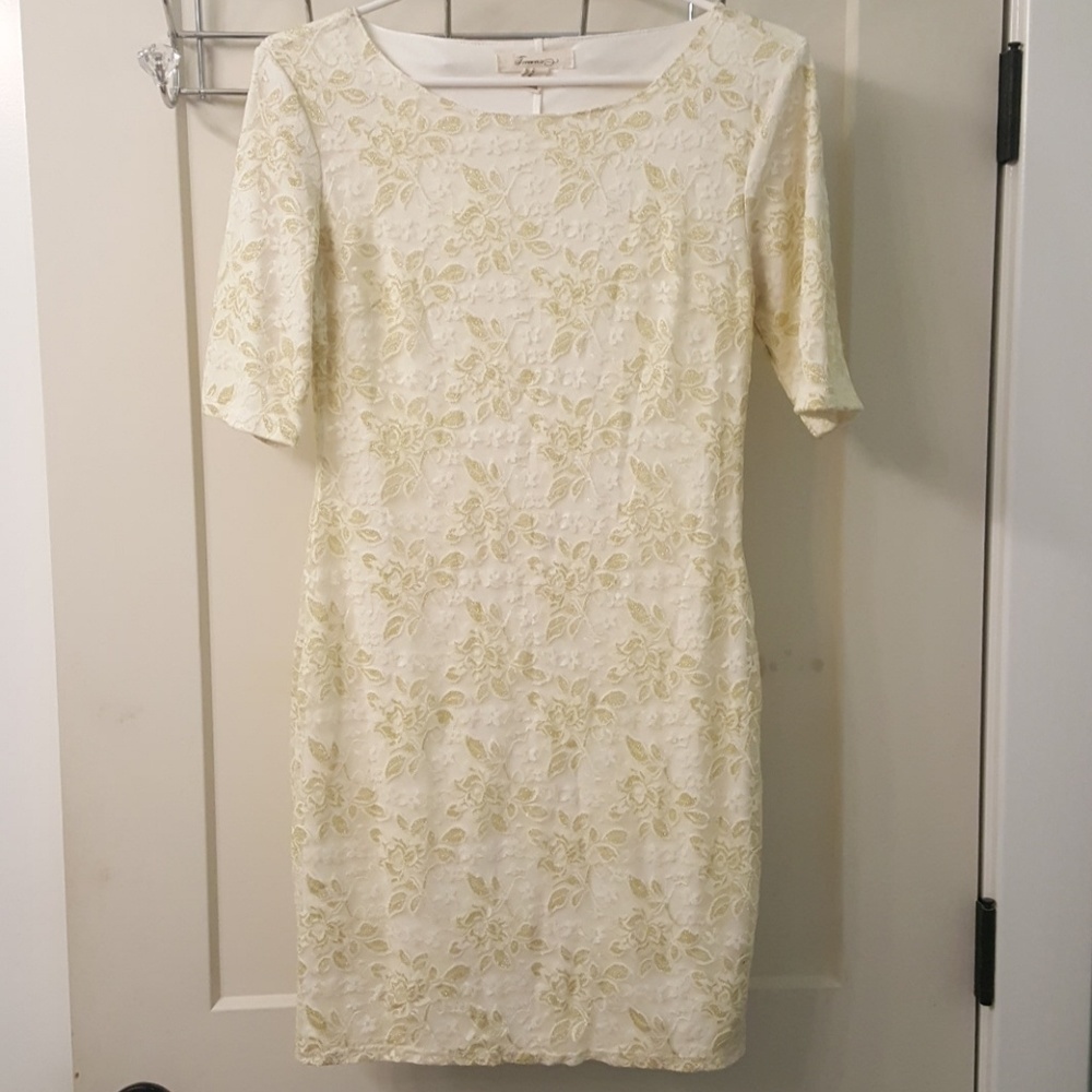 White and gold lace dress